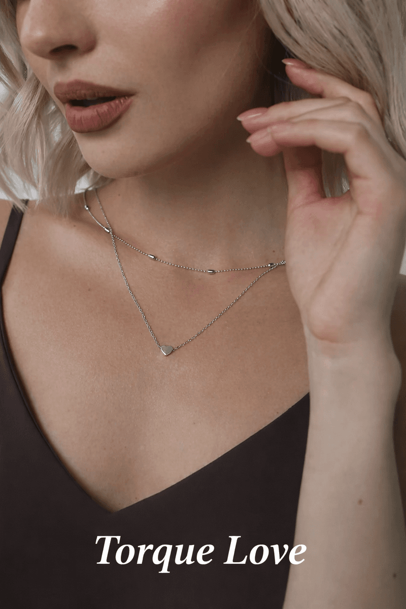 Women's neck chain in silver with a heart